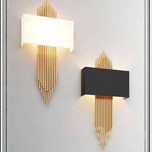 Vee wall light with gold strands